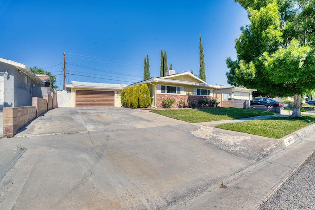 45209 Lorimer Ave, Lancaster, CA 93534 - single story home with driveway, a garage, and brick siding