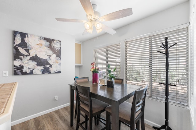 37940 E 42nd St Apt 115, Palmdale, CA 93552 - dining area with ceiling fan, wood finished floors, and baseboards