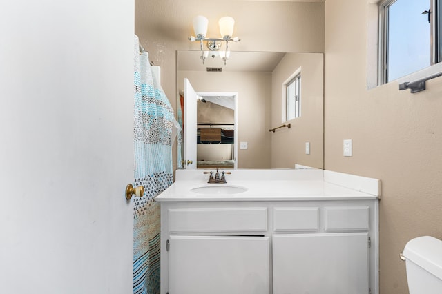37940 E 42nd St Apt 115, Palmdale, CA 93552 - bathroom featuring toilet and vanity