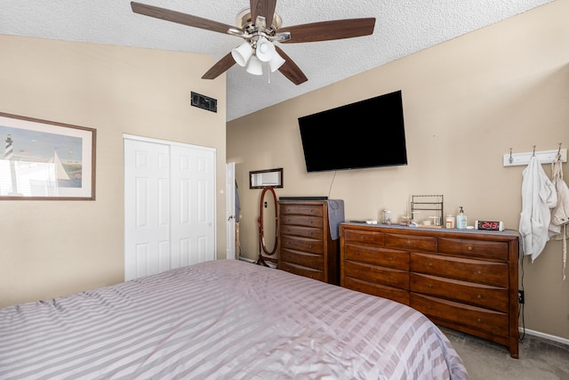 37940 E 42nd St Apt 115, Palmdale, CA 93552 - bedroom featuring carpet flooring, vaulted ceiling, a closet, a textured ceiling, and a ceiling fan