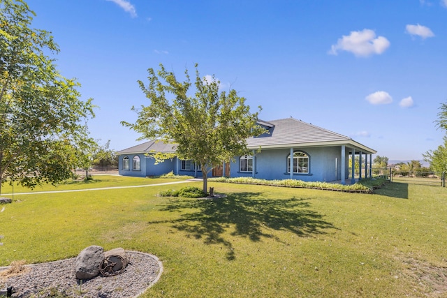 view of front of home with a front lawn