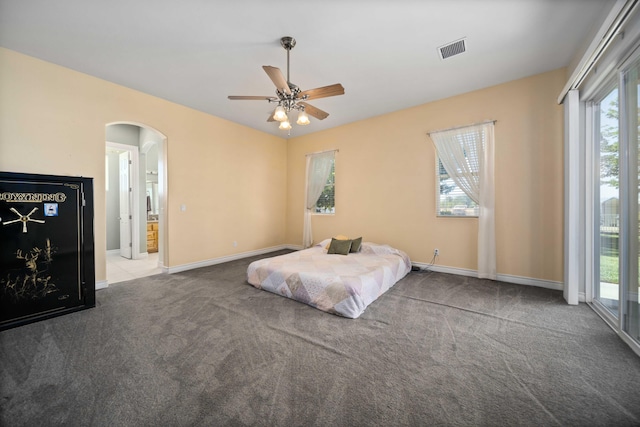 unfurnished bedroom featuring access to exterior, light carpet, and ceiling fan