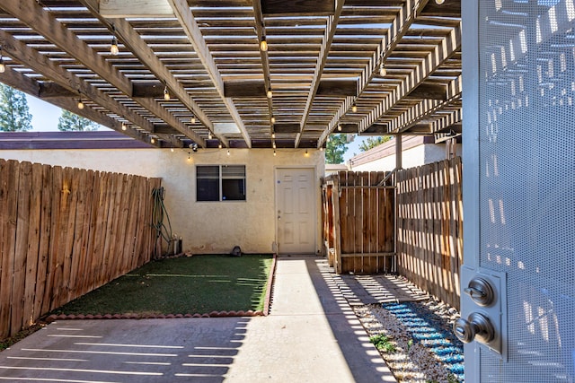 view of patio featuring a pergola