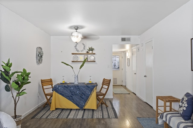 dining room featuring hardwood / wood-style flooring