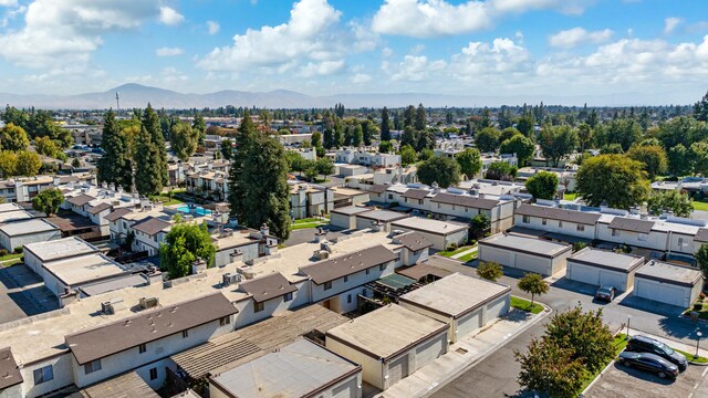 drone / aerial view featuring a mountain view