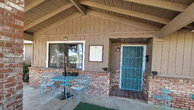 21104 Hillcrest Ct, Tehachapi, CA 93561 - view of exterior entry with a patio area