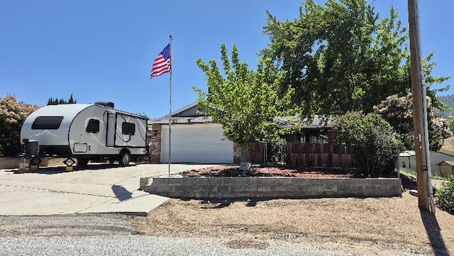 21104 Hillcrest Ct, Tehachapi, CA 93561 - view of front of property featuring driveway and a garage