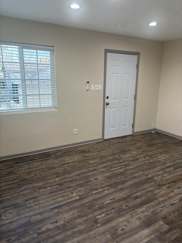 26920 Cote St, Boron, CA 93516 - unfurnished room with baseboards, dark wood-style flooring, and recessed lighting