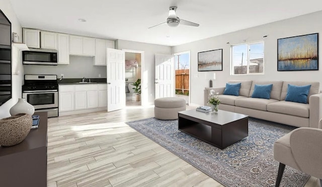 209 Pictorial St, Palmdale, CA 93550 - living area featuring ceiling fan and light wood finished floors