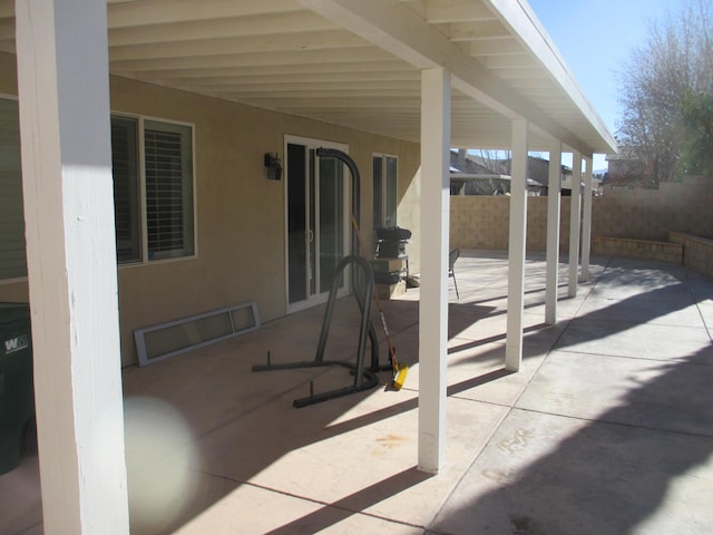 view of patio with fence