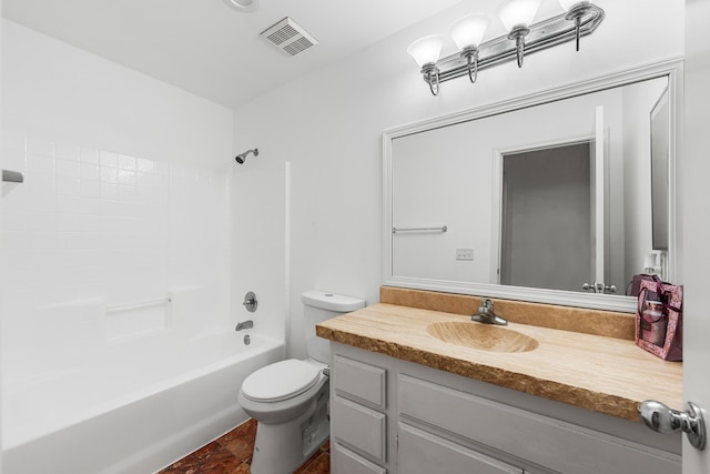 full bathroom featuring vanity, bathtub / shower combination, and toilet