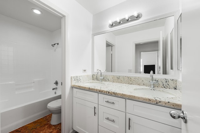 full bathroom with vanity, toilet, and washtub / shower combination