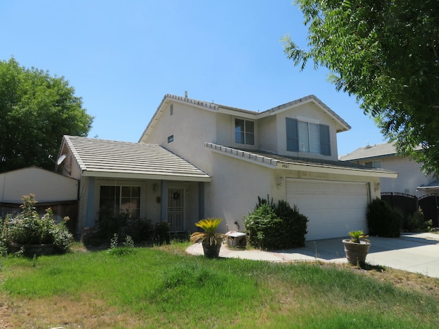 traditional home featuring a tiled roof, stucco siding, driveway, and a garage