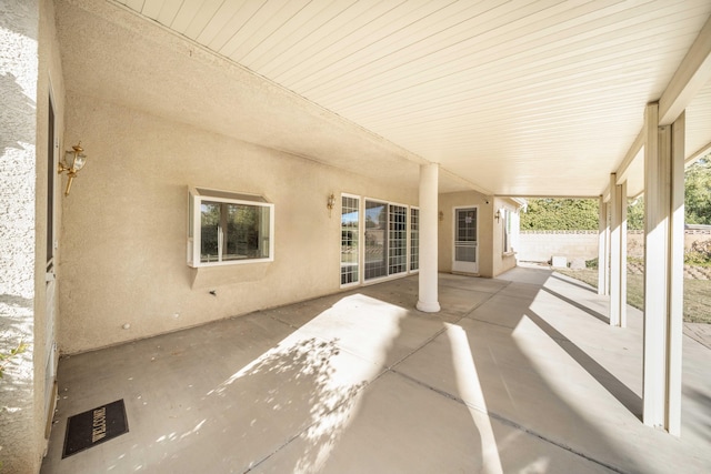 view of patio / terrace featuring fence