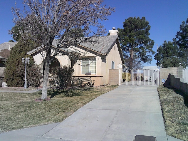 view of home's exterior with a lawn