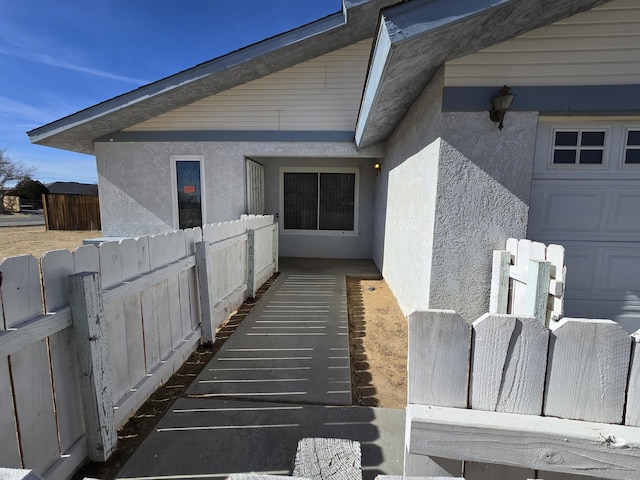 view of property exterior featuring a garage