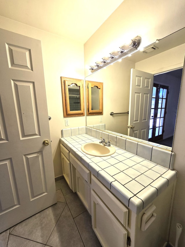 bathroom featuring vanity and tile patterned floors