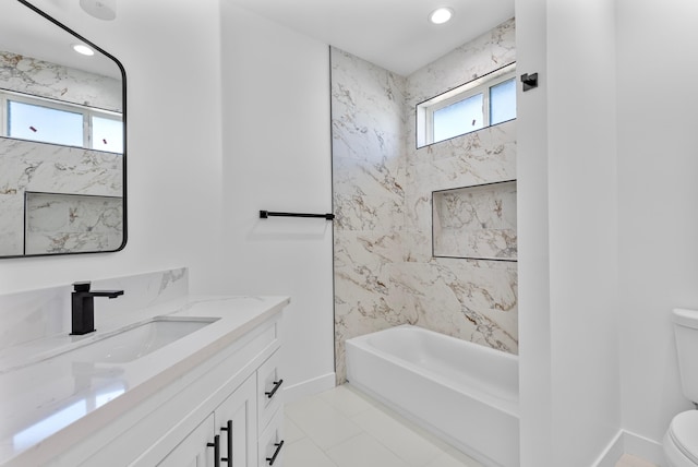 full bathroom featuring toilet, shower / tub combination, recessed lighting, baseboards, and vanity