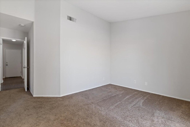 spare room with carpet floors