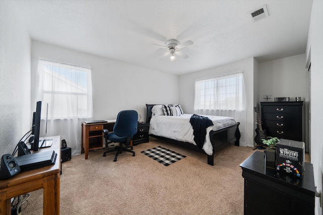 bedroom featuring carpet floors and ceiling fan