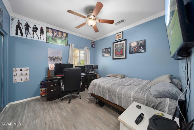 43432 Bale Ct, Lancaster, CA 93535 - bedroom featuring wood finished floors, crown molding, a desk, and a ceiling fan