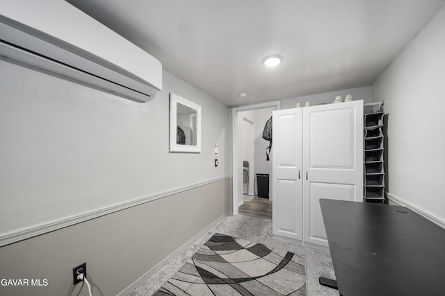 43432 Bale Ct, Lancaster, CA 93535 - hallway featuring a wall mounted AC and light carpet