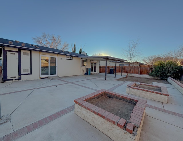 back of property with a patio area