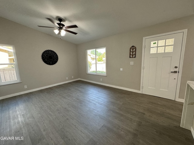 25561 Alicante Dr, Santa Clarita, CA 91355 - foyer featuring a ceiling fan, dark wood-type flooring, vaulted ceiling, and a textured ceiling
