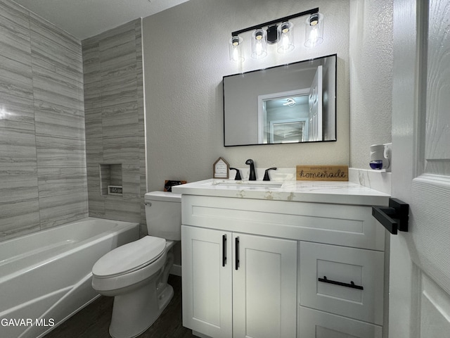 25561 Alicante Dr, Santa Clarita, CA 91355 - full bathroom featuring vanity, a textured wall, bathtub / shower combination, and wood finished floors