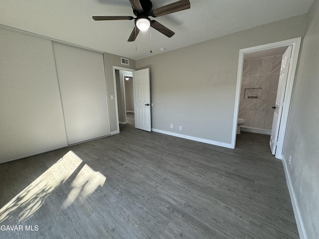 25561 Alicante Dr, Santa Clarita, CA 91355 - unfurnished bedroom with dark wood finished floors, connected bathroom, a closet, and ceiling fan