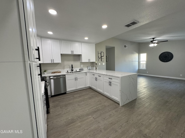 25561 Alicante Dr, Santa Clarita, CA 91355 - kitchen with dishwasher, freestanding refrigerator, a peninsula, white cabinetry, and a ceiling fan