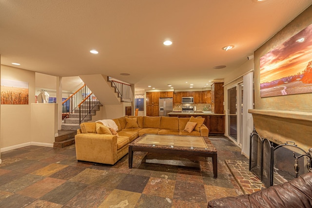 28367 Mount Stephen Ave, Santa Clarita, CA 91387 - living room featuring recessed lighting, stairs, dark stone finish floors, and baseboards