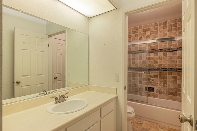 28367 Mount Stephen Ave, Santa Clarita, CA 91387 - full bathroom with toilet, vanity, shower / bath combination, and stone finish flooring