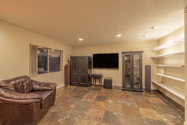 28367 Mount Stephen Ave, Santa Clarita, CA 91387 - living room with stone tile floors, baseboards, recessed lighting, and beverage cooler