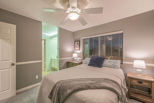28367 Mount Stephen Ave, Santa Clarita, CA 91387 - carpeted bedroom with a ceiling fan, ensuite bath, and baseboards