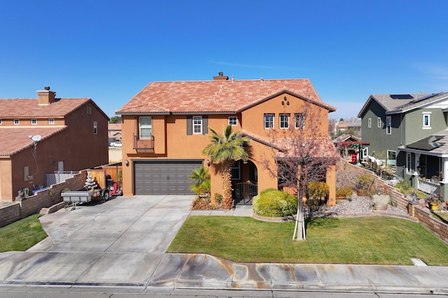 view of front facade with a garage and a front yard