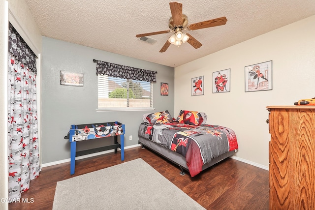 1037 Herzel Ave, Lancaster, CA 93535 - bedroom with a textured ceiling, wood finished floors, and a ceiling fan