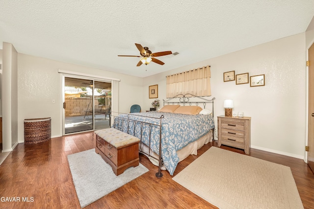1037 Herzel Ave, Lancaster, CA 93535 - bedroom featuring access to outside, wood finished floors, a ceiling fan, and a textured ceiling