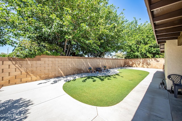 1037 Herzel Ave, Lancaster, CA 93535 - fenced backyard featuring a patio area