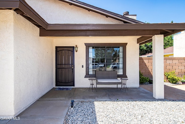 1037 Herzel Ave, Lancaster, CA 93535 - doorway to property with stucco siding