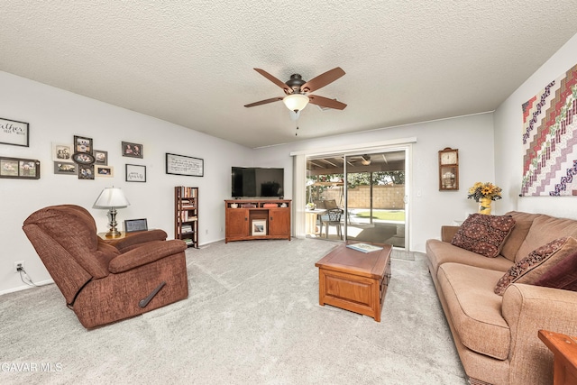 1037 Herzel Ave, Lancaster, CA 93535 - living room with ceiling fan, light colored carpet, and a textured ceiling