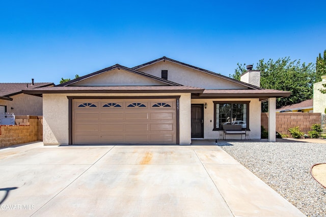 1037 Herzel Ave, Lancaster, CA 93535 - ranch-style house featuring stucco siding, a chimney, an attached garage, and concrete driveway