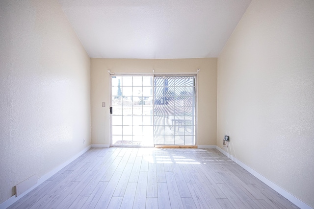 42443 Surrey Ct, Quartz Hill, CA 93536 - empty room with light wood finished floors, baseboards, and a textured wall