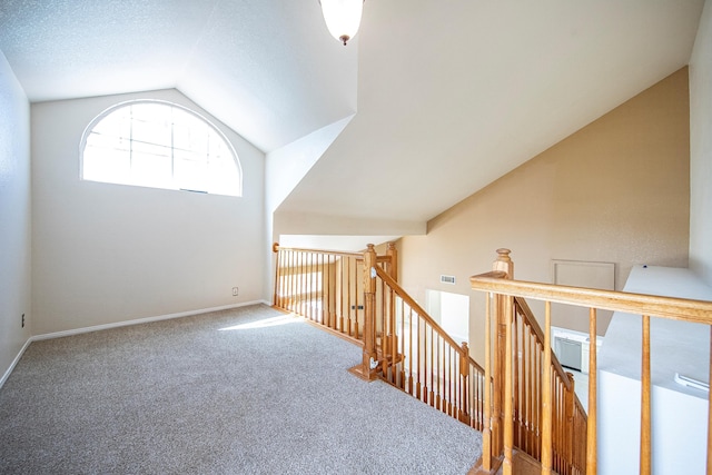 42443 Surrey Ct, Quartz Hill, CA 93536 - additional living space with lofted ceiling, carpet, and baseboards
