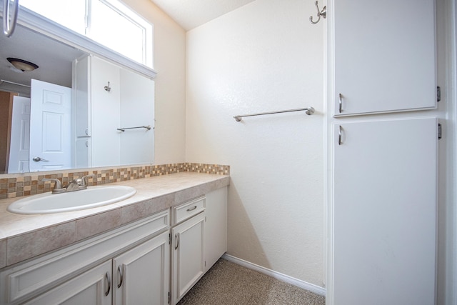 42443 Surrey Ct, Quartz Hill, CA 93536 - bathroom featuring vanity and baseboards