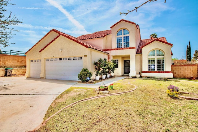 42443 Surrey Ct, Quartz Hill, CA 93536 - mediterranean / spanish house featuring a tile roof, a garage, stucco siding, and concrete driveway