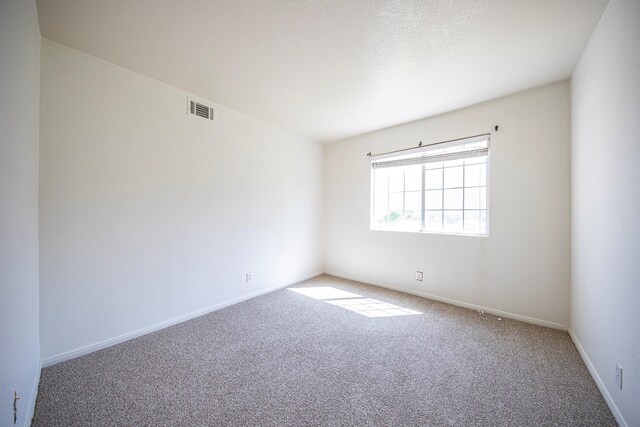 42443 Surrey Ct, Quartz Hill, CA 93536 - unfurnished room with carpet floors and baseboards