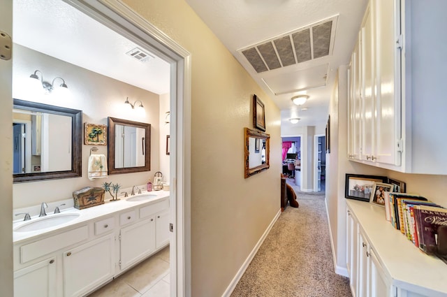 39884 Golfers Dr, Palmdale, CA 93551 - corridor with a sink, attic access, light carpet, and baseboards