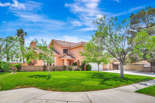 39884 Golfers Dr, Palmdale, CA 93551 - mediterranean / spanish home with concrete driveway, stucco siding, and a tiled roof
