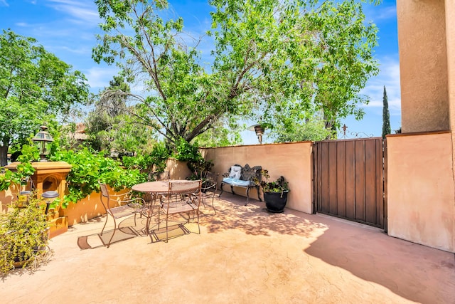 39884 Golfers Dr, Palmdale, CA 93551 - view of patio with outdoor dining area and fence